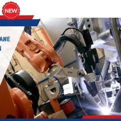Zrobotyzowane spawanie TIG: pomarańczowe ramię robota precyzyjnie spawa metal, tworząc jasny łuk spawalniczy.
